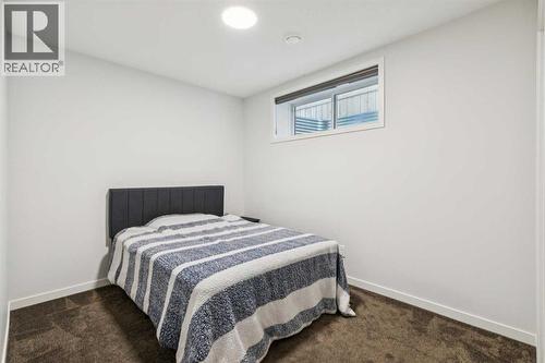 86 Creekside Way Sw, Calgary, AB - Indoor Photo Showing Bedroom