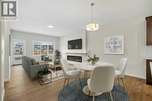 136 Wolf Hollow Manor Se, Calgary, AB - Indoor With Fireplace