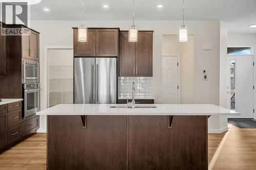 136 Wolf Hollow Manor Se, Calgary, AB - Indoor Photo Showing Kitchen With Upgraded Kitchen