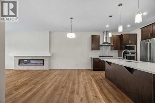 136 Wolf Hollow Manor Se, Calgary, AB - Indoor Photo Showing Kitchen With Upgraded Kitchen