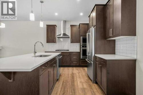 136 Wolf Hollow Manor Se, Calgary, AB - Indoor Photo Showing Kitchen With Upgraded Kitchen