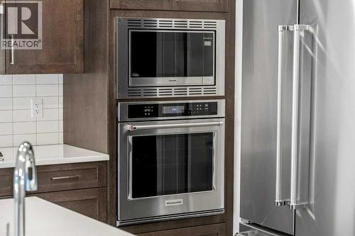 136 Wolf Hollow Manor Se, Calgary, AB - Indoor Photo Showing Kitchen With Upgraded Kitchen