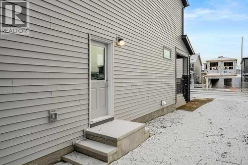 136 Wolf Hollow Manor Se, Calgary, AB - Outdoor With Deck Patio Veranda With Exterior