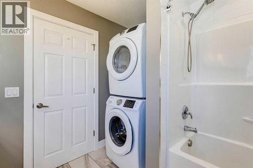 123 Marquis Green Se, Calgary, AB - Indoor Photo Showing Laundry Room