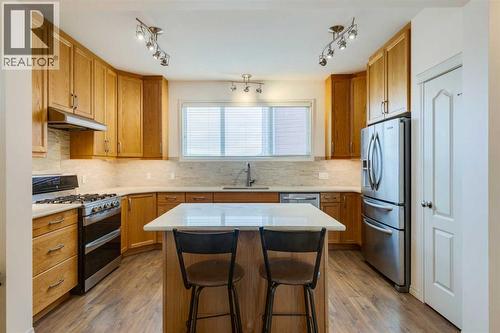 123 Marquis Green Se, Calgary, AB - Indoor Photo Showing Kitchen With Upgraded Kitchen