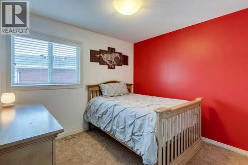 123 Marquis Green Se, Calgary, AB - Indoor Photo Showing Bedroom