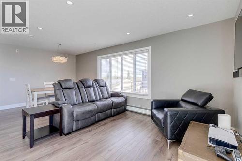 123 Marquis Green Se, Calgary, AB - Indoor Photo Showing Living Room
