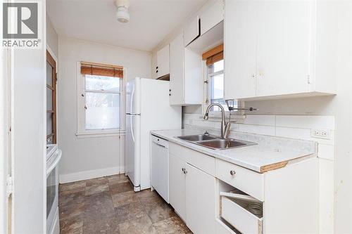2820 Parkdale Boulevard Nw, Calgary, AB - Indoor Photo Showing Kitchen With Double Sink