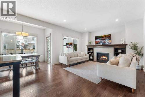 35 Aspenshire Drive Sw, Calgary, AB - Indoor Photo Showing Living Room With Fireplace