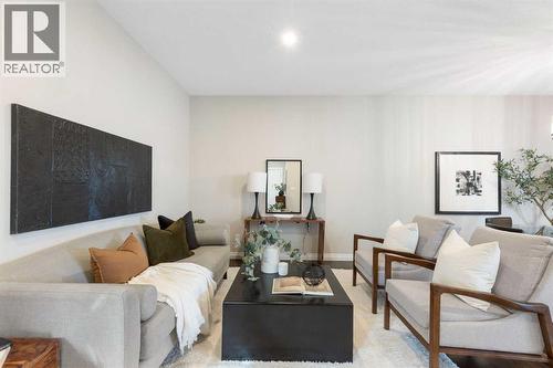100 Lakeside View, Strathmore, AB - Indoor Photo Showing Living Room