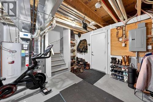 Lower level with mechanical area and access to the double attached garage - 37 Aspen Hills Terrace Sw, Calgary, AB - Indoor Photo Showing Basement