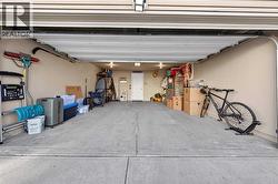 Double attached garage with room for vehicles, storage, and gear - 