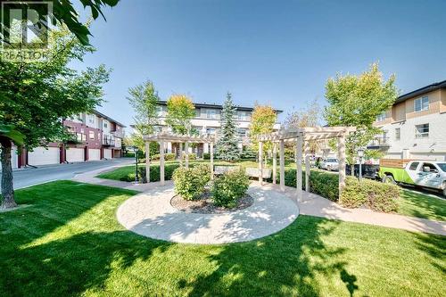 Common area shown in summer. Walking paths, mature trees, and space to slow down - 37 Aspen Hills Terrace Sw, Calgary, AB - Outdoor