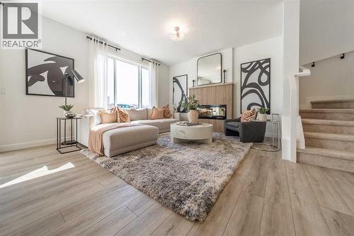 211 Langwell Common Se, Airdrie, AB - Indoor Photo Showing Living Room