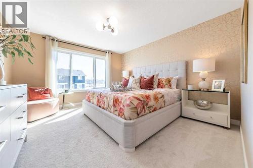 211 Langwell Common Se, Airdrie, AB - Indoor Photo Showing Bedroom