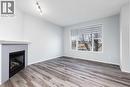 48 Covemeadow Road Ne, Calgary, AB  - Indoor Photo Showing Living Room With Fireplace 