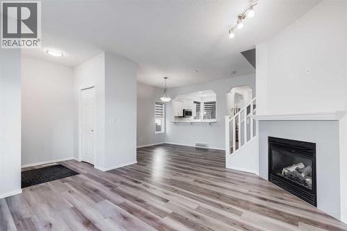 48 Covemeadow Road Ne, Calgary, AB - Indoor With Fireplace