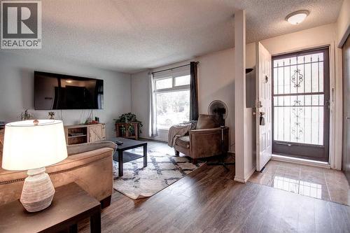 95 Falton Way Ne, Calgary, AB - Indoor Photo Showing Living Room