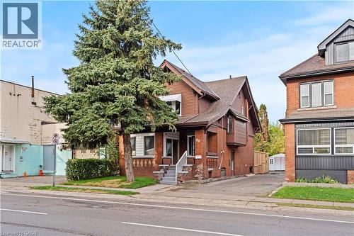 View of front of house with brick siding - 88 Gage Avenue S, Hamilton, ON - Outdoor With Facade