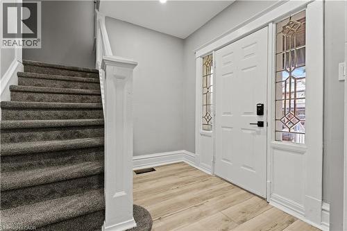 Foyer entrance featuring stairs and light wood finished floors - 88 Gage Avenue S, Hamilton, ON - Indoor Photo Showing Other Room