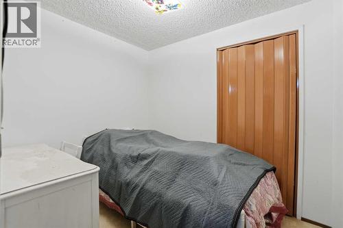 5224 5 Avenue Se, Calgary, AB - Indoor Photo Showing Bedroom