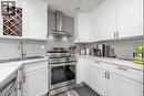 1347 Berkley Drive Nw, Calgary, AB  - Indoor Photo Showing Kitchen With Upgraded Kitchen 