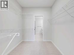 Primary Walk-in Closet - 