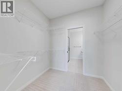 Primary Walk-in Closet - 