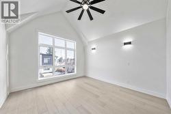 Impressive cathedral ceiling feature in primary bedroom - 