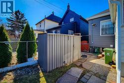 View of side of property featuring fence - 