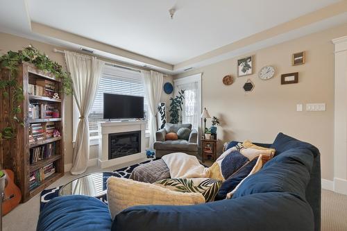 #301-975 Victoria  W Street, Kamloops, BC - Indoor Photo Showing Living Room With Fireplace