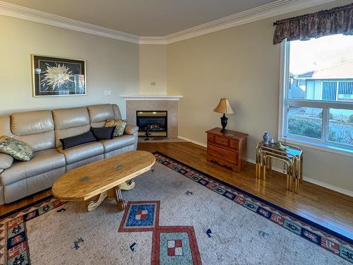 12-2 Royal Ann Court, Osoyoos, BC - Indoor Photo Showing Living Room With Fireplace