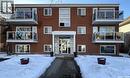 2060 Lorne Street, Regina, SK  - Outdoor With Balcony With Facade 