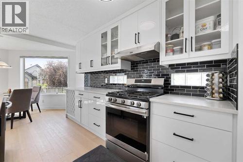 Kitchen - 7 Country Hills Park Nw, Calgary, AB - Indoor Photo Showing Kitchen With Upgraded Kitchen