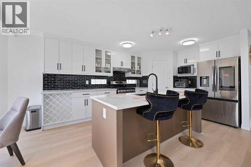 Kitchen - 7 Country Hills Park Nw, Calgary, AB - Indoor Photo Showing Kitchen With Stainless Steel Kitchen With Upgraded Kitchen