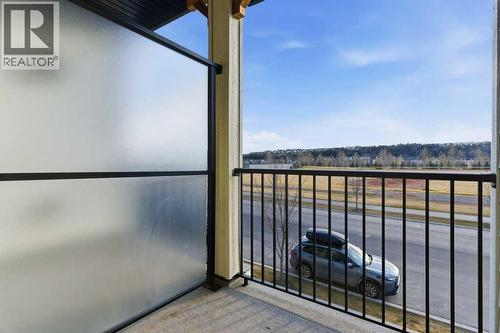 102, 156 Park Street, Cochrane, AB - Outdoor With Balcony With View