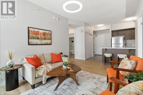 421 - 640 Sauve Street, Milton, ON - Indoor Photo Showing Living Room
