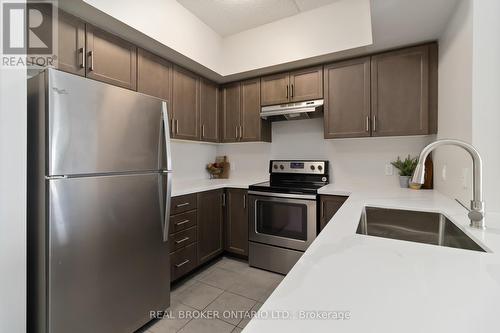 421 - 640 Sauve Street, Milton, ON - Indoor Photo Showing Kitchen With Upgraded Kitchen