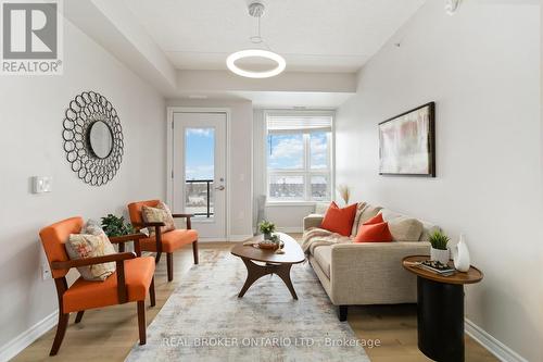 421 - 640 Sauve Street, Milton, ON - Indoor Photo Showing Living Room