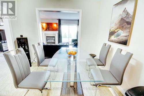 21 Faith Boulevard, St. Thomas, ON - Indoor Photo Showing Dining Room With Fireplace