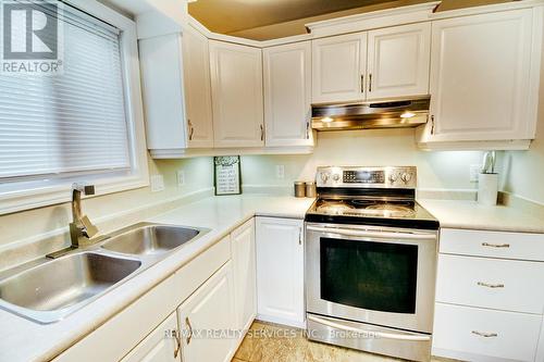 21 Faith Boulevard, St. Thomas, ON - Indoor Photo Showing Kitchen With Double Sink