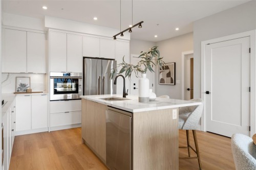111-1810 Selenite Pl, Langford, BC - Indoor Photo Showing Kitchen With Upgraded Kitchen