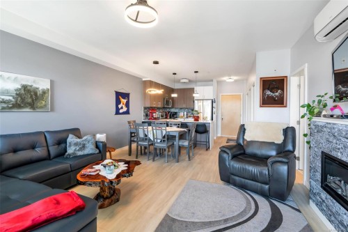 506-810 Orono Ave, Langford, BC - Indoor Photo Showing Living Room With Fireplace