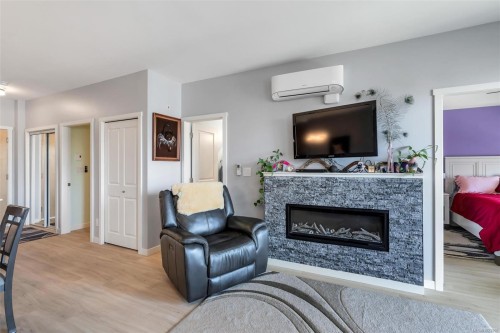 506-810 Orono Ave, Langford, BC - Indoor Photo Showing Living Room With Fireplace