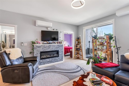 506-810 Orono Ave, Langford, BC - Indoor Photo Showing Living Room With Fireplace