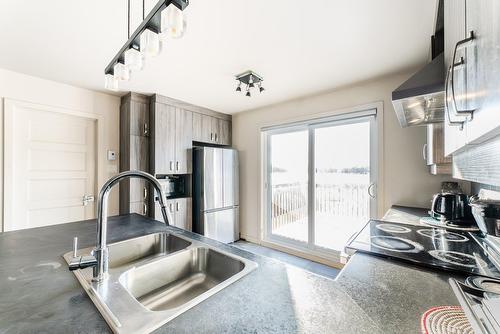 Cuisine - 1414 Rue Du Souvenir, Saint-Eustache, QC - Indoor Photo Showing Kitchen With Double Sink