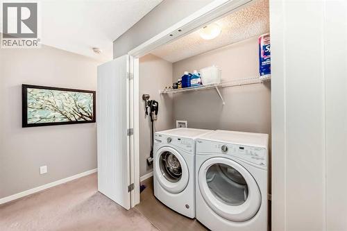 309 Nolanlake Villas Nw, Calgary, AB - Indoor Photo Showing Laundry Room