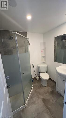 Bathroom featuring vanity and a stall shower - 18 Ingleside Drive, Kitchener, ON - Indoor Photo Showing Bathroom