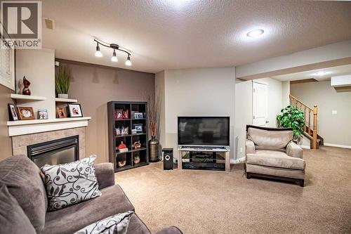 261 Jenner Crescent, Red Deer, AB - Indoor With Fireplace