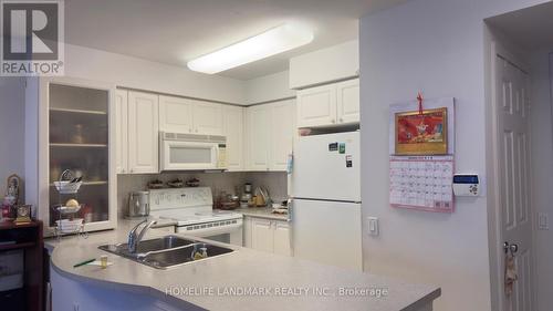 807 - 388 Bloor Street E, Toronto, ON - Indoor Photo Showing Kitchen With Double Sink